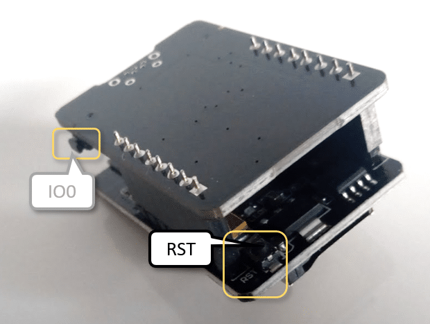RST (Reset) button on ESP32-CAM module