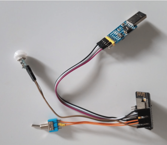 FTDI Adapter and PIR Sensor connected to ESP32-CAM